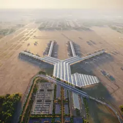Nowoczesny terminal lotniczy, przypominający kształtem literę Y, z wieloma samolotami przy rękawach. To wizja największego lotniska w Europie, otoczonego pasami startowymi i zielenią.